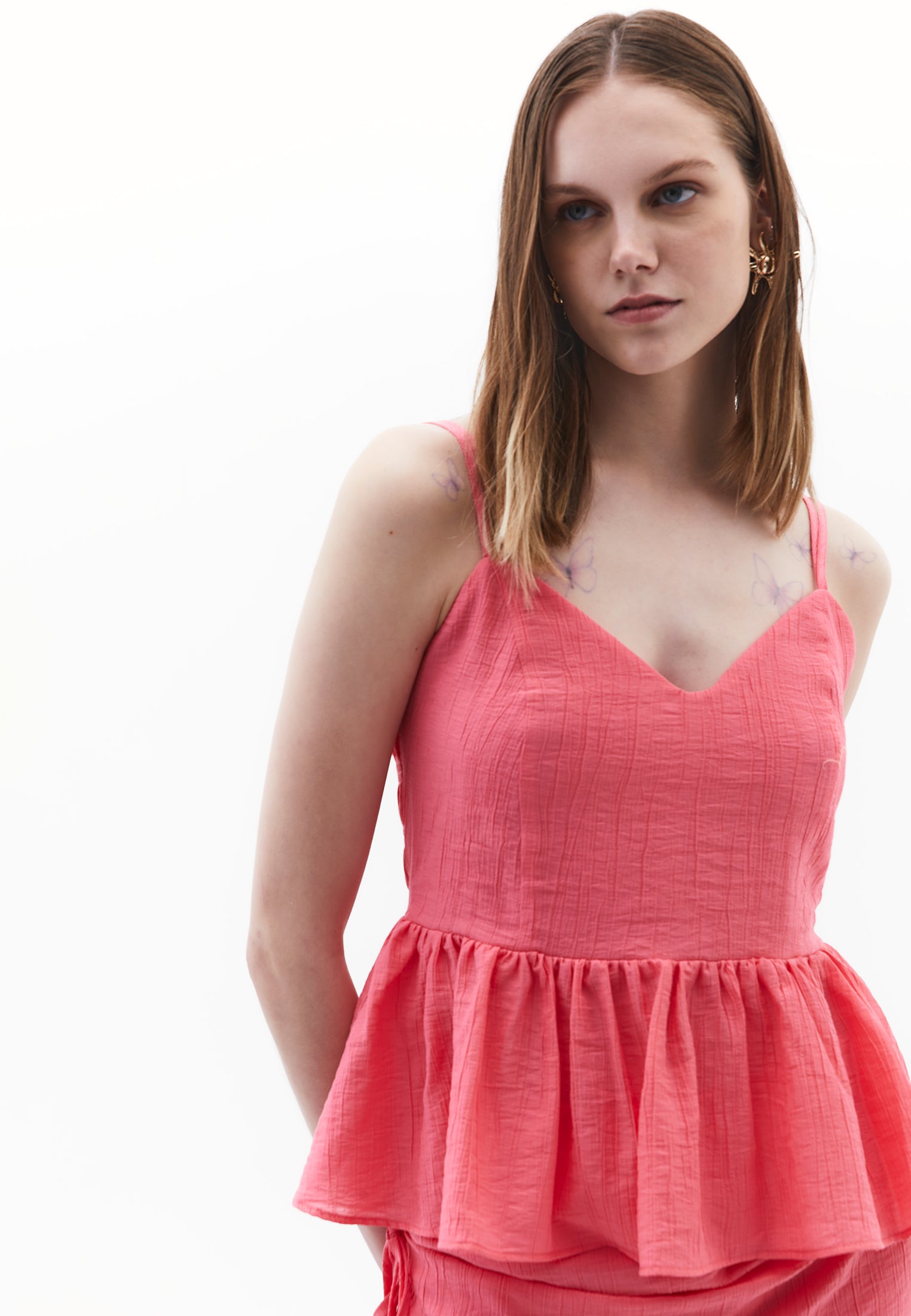 بلوزة بدون أكمام بياقة على شكل حرف V - ليمونادة وردية